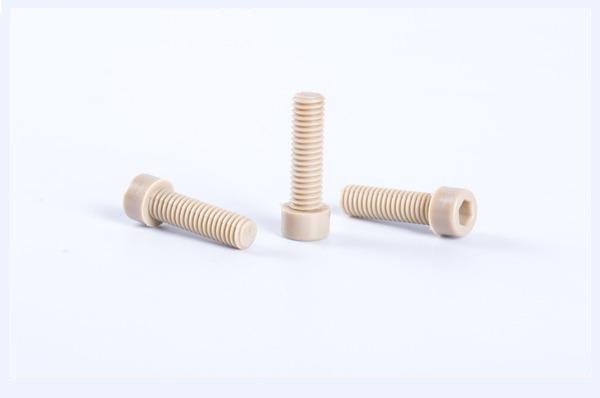 Vis à tête hexagonale creuse cruciforme en PEEK