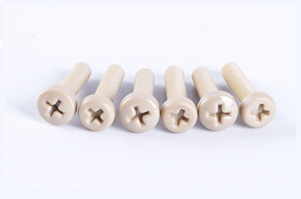 Vis à tête ronde cruciforme en PEEK