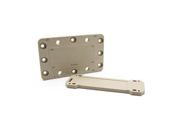 Plaque d’extrémité en PEEK