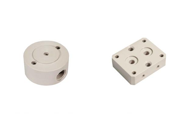 Tête de pompe en PEEK